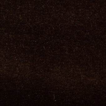Dark brown velvet texture with a dense, short pile and subtle nap, featuring interwoven threads for added depth and a matte finish.