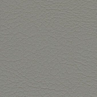 Faux leather texture, cool gray “perle” color, mottled surface with irregular pattern and matte finish, suitable for upholstery applications.