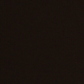 Dark gradient background with a single red dot in the lower right, featuring a uniform, featureless composition and subtle tonal variation.