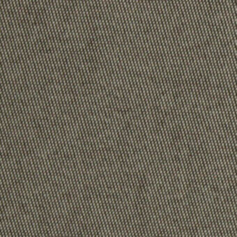 Woven fabric texture, gray and beige heathered tones, dense grid pattern, matte finish, sample material with “horm > outdoor flukso” text.