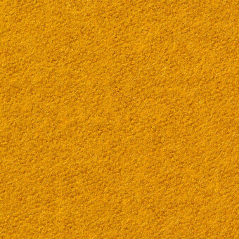 Golden-yellow fibrous texture with embedded text “horm > vescom lani (top) > vescom lani 7060 29”, displaying a dense, granular, and slightly rough surface.