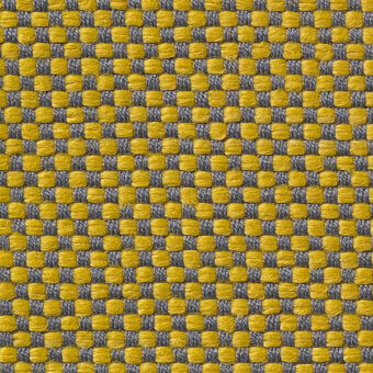 Woven checkerboard fabric, mustard yellow and dark gray, tight regular weave with matte finish; text reads “horm > vescom samar 7052”.