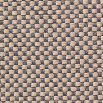 Beige and gray woven textile sample features a grid pattern, dense weave, and subtle texture with printed product codes along the edge.