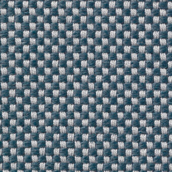 Textile sample with repeating teal and light gray rectangular blocks in a dense weave, matte finish, labeled “vescom samar 7052 43”.