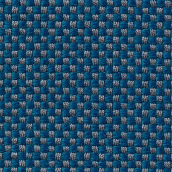 Woven textile texture features a grid of teal and light gray square blocks, displaying a consistent geometric pattern with raised surface detail.