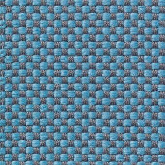 Woven fabric texture features turquoise and gray checkerboard pattern, dense basketweave construction, subtle sheen, with “vescom samar 7052 50” label.