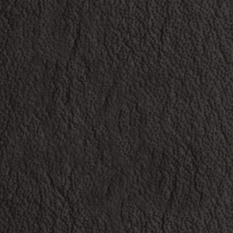 Dark gray textured surface with irregular speckling and undulating grain pattern, matte finish, creating depth and subtle tonal variations.