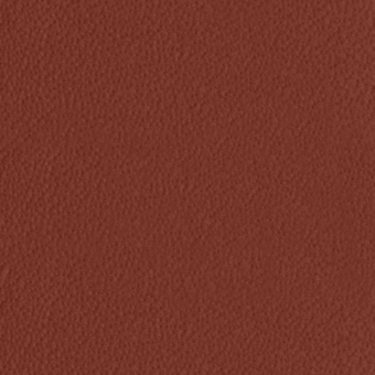 Reddish-brown textured surface resembling suede, granular and uneven, with “kobe > col.5305” text, likely upholstery fabric sample.