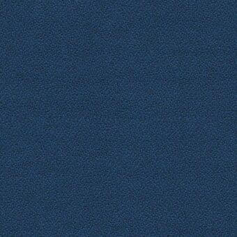 Blue fabric texture sample with granular surface, displaying “lacividina” label; dense, speckled appearance under even lighting.