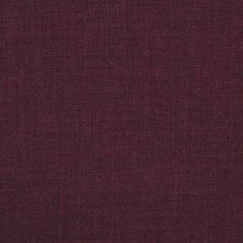 Burgundy fabric swatch displaying a dense weave and matte finish, with a subtle grain suggesting linen or a linen blend material.