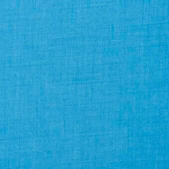 Turquoise fabric texture with a tight, irregular weave and matte finish, displaying consistent color and substantial density throughout the sample.