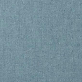 Woven fabric texture, dusty blue color, consistent fine grain, matte finish, dense weave suitable for upholstery applications.