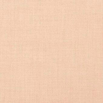 Peach linen fabric sample displaying a tight knit, grid pattern with a matte finish and subtle thread variations.