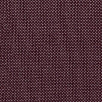Burgundy geometric fabric with a square grid pattern, featuring lighter gray motifs and a dense, matte weave for upholstery or drapery.