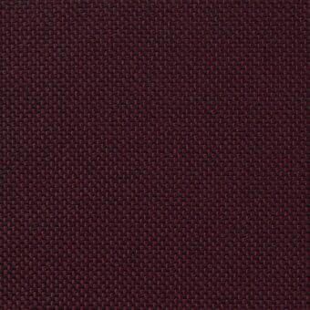 Burgundy upholstery fabric with a dense, nubby weave and heathered texture; small repeating pattern, matte finish, label reads “7052.33”.