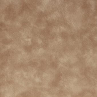 Textured fabric sample in tan, beige, and light brown tones displays a mottled, diffused pattern with a matte finish and woven texture.