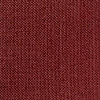 Terracotta fabric with a dense, square weave and matte finish displays uniform texture and subtle tonal variations throughout the composition.