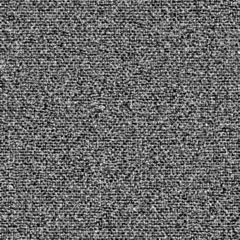 Grayscale granular texture with irregular, circular shapes distributed randomly across the frame, creating a mottled, chaotic visual composition.