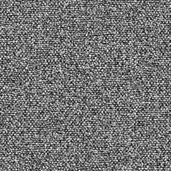 Grayscale granular texture composed of densely packed, irregular dark and light gray shapes with a rough, uneven surface and uniform lighting.