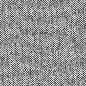Abstract black and white texture with chaotic arrangement of circular and oval shapes, creating a mottled, granular, and non-repeating pattern.