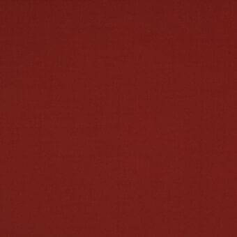 Stretch fabric swatch, red-brown color, fine weave texture, matte finish, consistent tone, studio shot against a neutral backdrop.