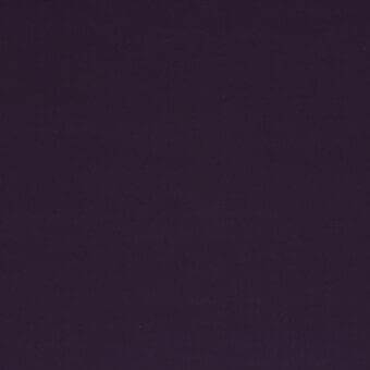 Dark purple stretchy fabric sample with a matte finish and tight woven texture, displaying a subtle grid pattern against a neutral backdrop.