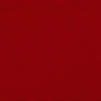 Red fabric texture displaying a dense, uniform weave and granular surface with consistent color and diffused, even lighting.