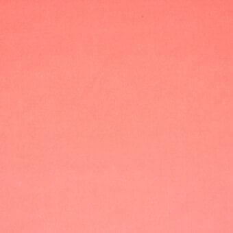 Coral-pink fabric texture sample, matte finish, woven material, consistent warm tone, identified as “115 superb” from the Lacividina superb collection.