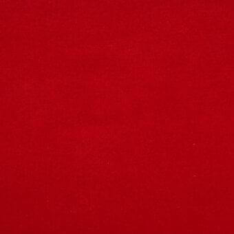 Red woven fabric with a matte texture, consistent crimson color, and close-up studio lighting showcasing textile detail.
