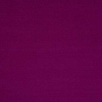 Solid purple fabric texture with a matte finish and tight weave, displaying consistent color and a uniform grain throughout the composition.