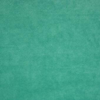 Muted teal fabric texture displays a mottled pattern with granular weave and diffused tonal shifts, presenting a slightly distressed appearance.
