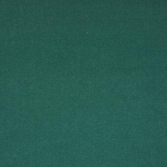 Teal woven fabric sample, possibly velvet, displays a dense, slightly uneven texture and consistent matte finish; lacividina collection.
