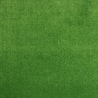 Green woven fabric texture with mottled tonal variations and a matte finish, resembling linen or a similar durable textile material.