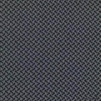 Woven fabric texture displaying a repeating pebble pattern in cool grays and charcoal tones, with a rough, tactile surface and uniform composition.
