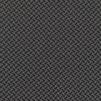 Grayscale fabric texture with a repeating dot pattern in a grid, exhibiting tonal variation and a matte finish, suggesting a durable synthetic weave.