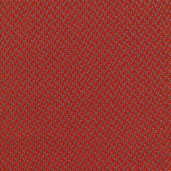 Orange and gray woven fabric displaying a dense, textured surface with horizontal bands and subtle geometric patterns.