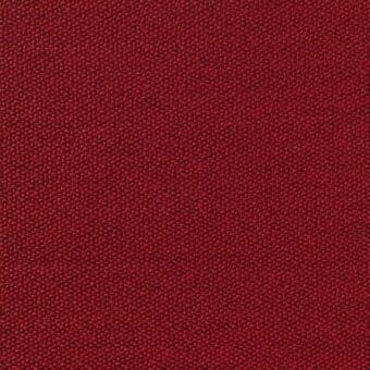 Red woven fabric with granular texture and subtle tonal variations, presented on a white background for material detail.