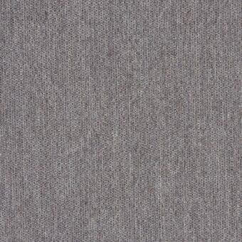 Woven fabric, muted gray, heathered texture; close-up of lacividina ‘27 molly’ textile displaying a dense, matte, twill weave with product labeling.