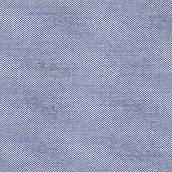 Blue fabric texture features a grid of small circles, creating a repeating pattern with a slightly lighter shade within the medium blue background.