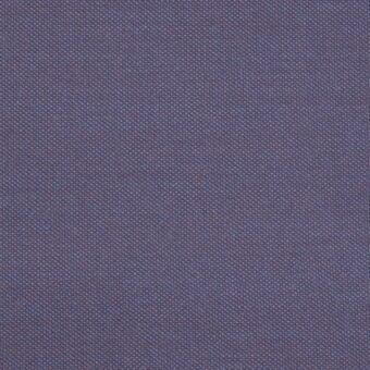 Indigo fabric sample with steel cut weave, featuring lighter blue and reddish-brown threads in a granular grid pattern; Lacividina fabrics collection.