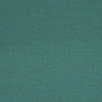 Woven teal fabric with heathered texture, displaying dense threads and subtle gray-silver undertones in a structured pattern.