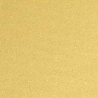 Yellow fabric sample with a granular woven texture, matte finish, and a desaturated ochre tone; label reads “lacividina 29 ariana 7029.03”.