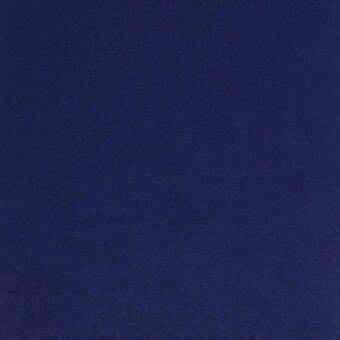 Navy blue woven textile sample with a felted texture, displaying a uniform grain; labeled “29 Ariana 7029.31” from the lacividina fabrics collection.