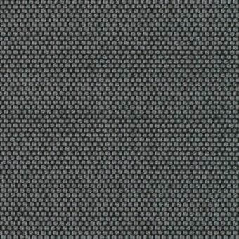 Woven fabric sample, dark charcoal gray, repetitive circular and linear pattern; “31 opera” from lacividina’s “opera 01457.54 carbon” collection.