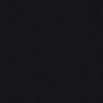 Ebony fabric texture from Lacividina’s 32 Arco range, displaying a dense weave and granular surface with subtle, irregular indentations.