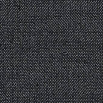 Dark gray textured fabric sample displaying a repeating dot pattern, woven construction, and granular surface with a consistent asphalt tone.