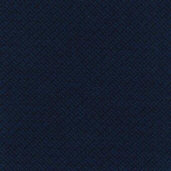 Blue textured fabric sample, “34 Cleo Ocean”, displays a dense dot pattern and tonal variations, creating a speckled, tactile navy surface.