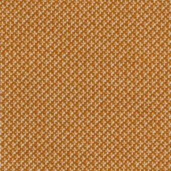 Orange and cream geometric fabric sample, dense woven texture with repeating diamond motifs, matte finish, from lacividina’s “34 Cleo” collection.