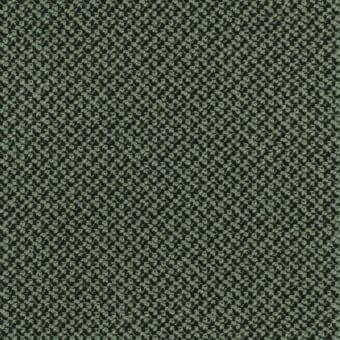 Sage green fabric texture with dense, repeating dark green floral pattern and matte finish, creating a granular textile appearance.