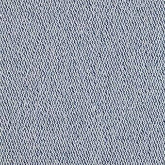 Woven fabric texture with speckled white and dark blue pattern, tight knit, matte finish, granular surface, uniform dispersion of dots.